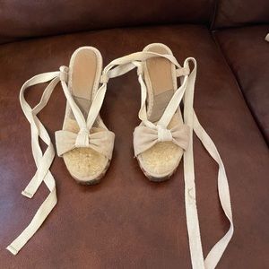 Beautiful Ugg heels in good preloved condition. Size 8. Beige & tan colors.